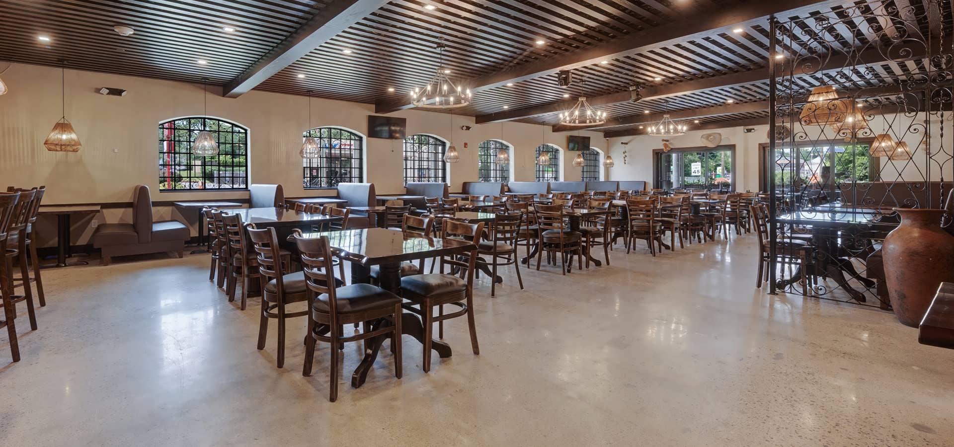 The warm, inviting dining room and bar at Hacienda Campos